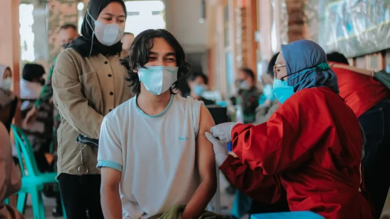 Vaksinasi Covid-19 Dosis Pertama di Jatim Baru Sasar 28 Persen Warga, Satgas: Tak Semua Daerah punya Sentra Vaksinasi