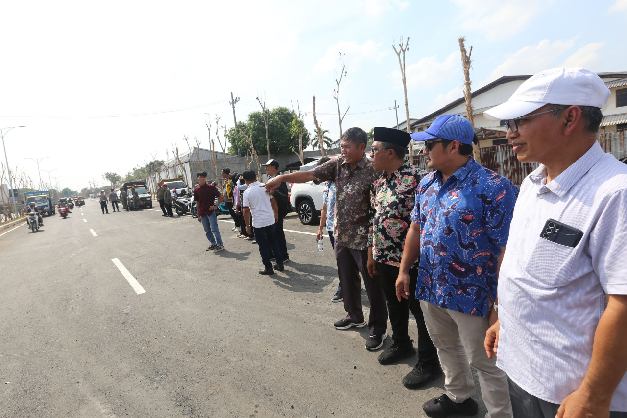 Warga Kelurahan Babat Jerawat menggelar acara tasyakuran atas rampungnya pengerjaan box culvert