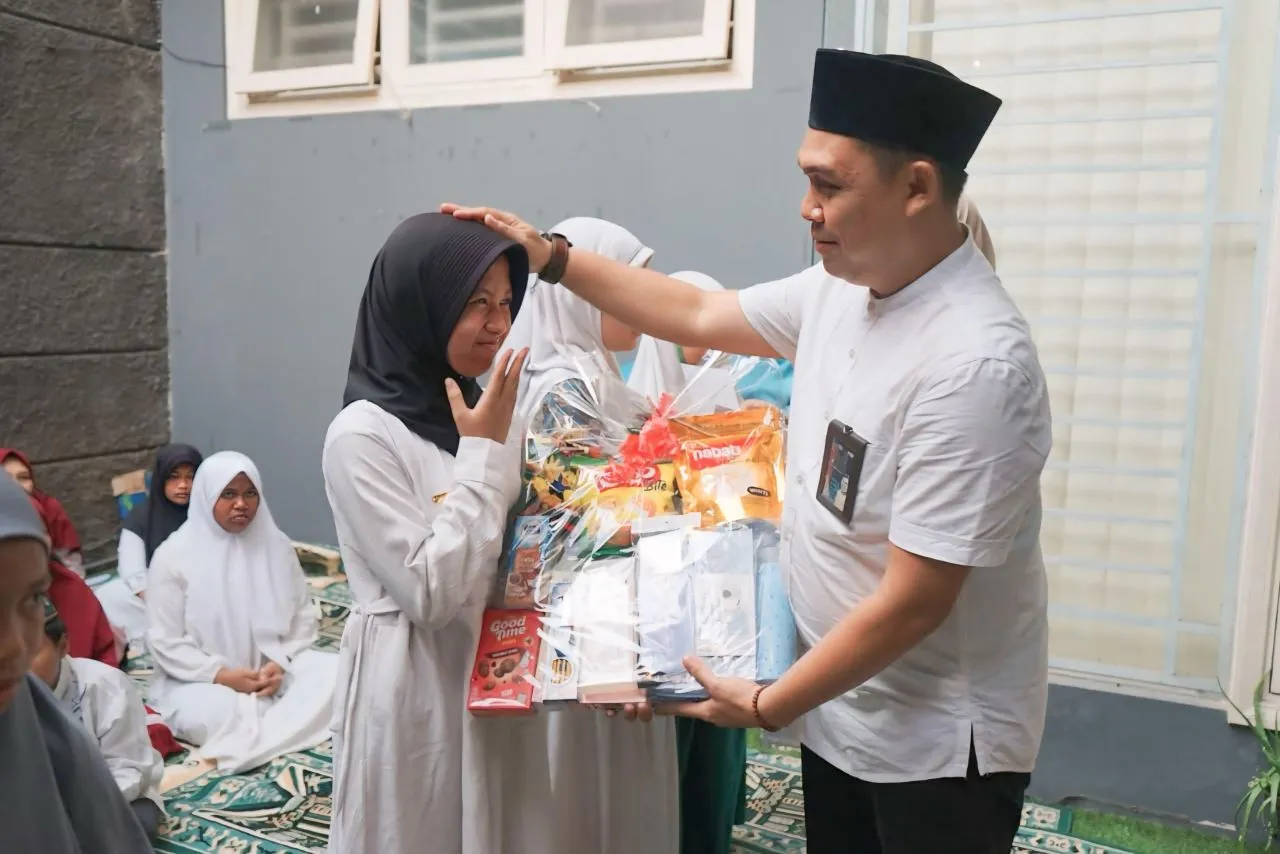 Tersenyum Bahagia, Puluhan Anak Yatim Terima Santunan dari PNM Cabang Surabaya