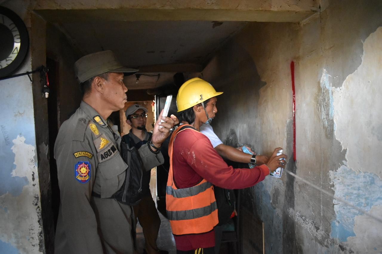 Program penertiban dan normalisasi di Sungai Kalianak