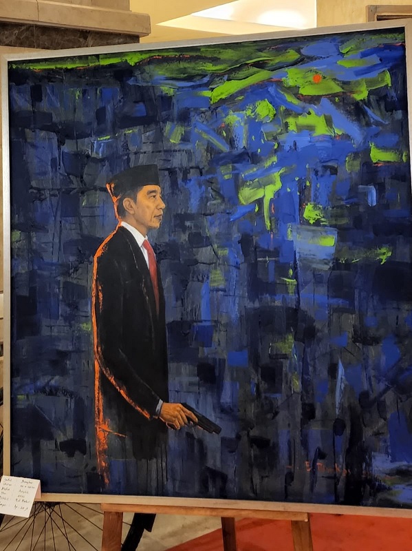 Sebuah lukisan Presiden Joko Widodo (Jokowi) menarik perhatian dalam pameran bertema Freedom of Harmony di Hotel Grand Cempaka, Jakarta Pusat, Selasa (23/8)