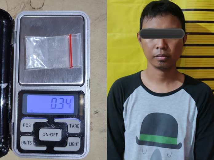 Tersangka dan barang buktinya.