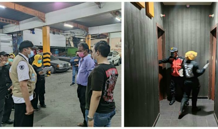 Petugas mendatangi Breakshot Karaoke di Jalan Kenjeran Surabaya.