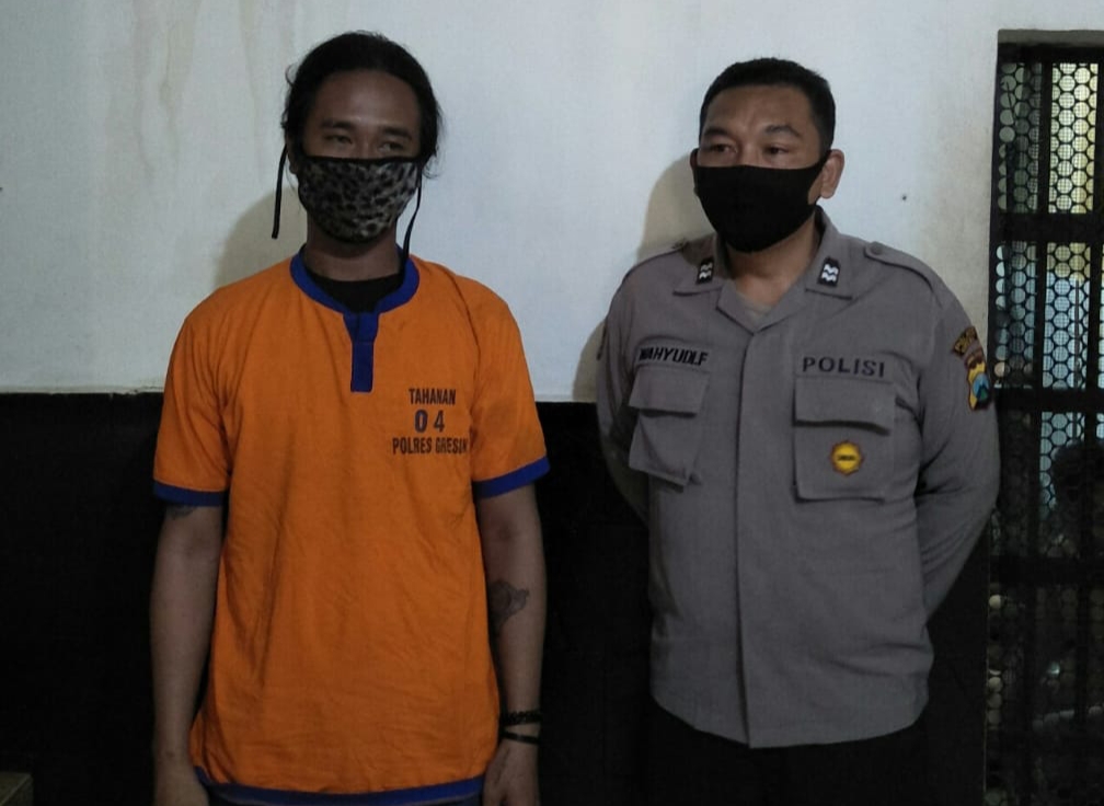 Bandar narkoba, Budi Santoso alias Patek diringkus Sat Narkoba Polres Gresik, Minggu (14/2/2021). (FOTO : TBK/BACASAJA.ID) 