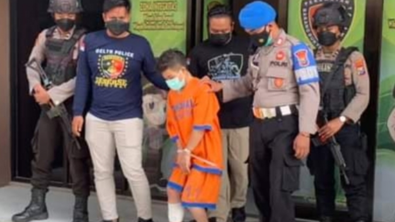 Pelaku saat digelandang Polisi.