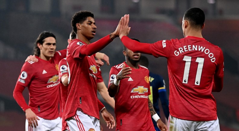 Pemain MU melakukan saat bertanding melawan Real Sociedad dalam leg kedua 32 besar di Stadion Old Trafford, Manchester.