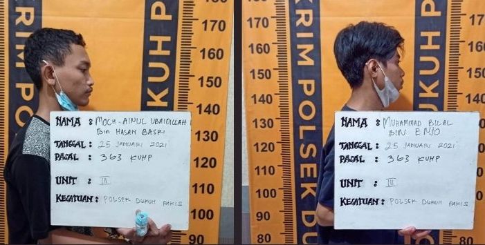 Kedua tersangka diamankan di Polsek Dukuh Pakis. 
