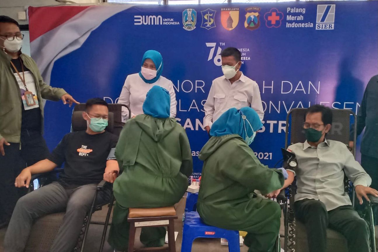 Ketua DPRD Surabaya Adi Sutarwijono dan Ketua Umum Kamar Dagang dan Industri (Kadin) Surabaya Ali Affandi.