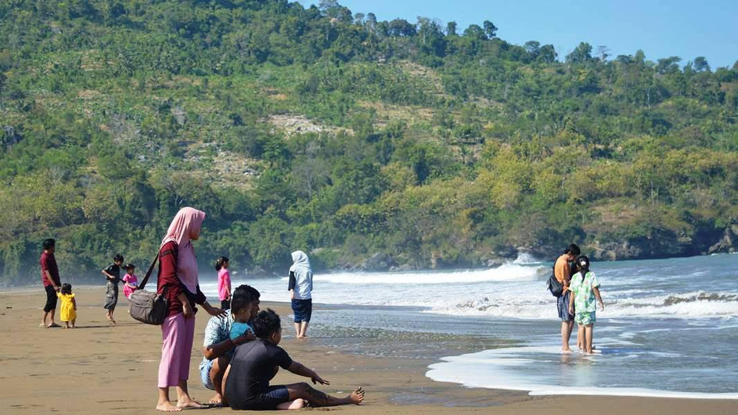 Ilustrasi liburan di pantai.